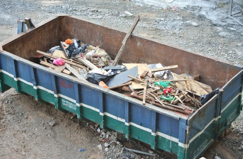 Demolition debris being cleared from a construction site in Dalston