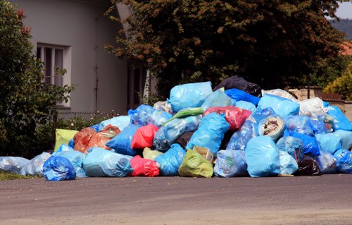 Skips lined up on a Dalston street for recycling